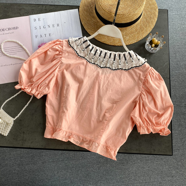 Modern női ing gyöngygombokkal