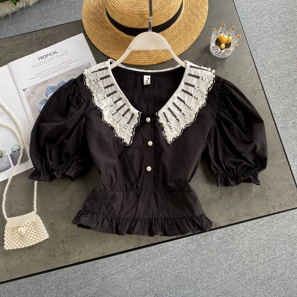 Modern női ing gyöngygombokkal