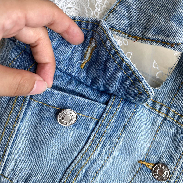 Praegune naiste teksajakk pitsi ja taskutega