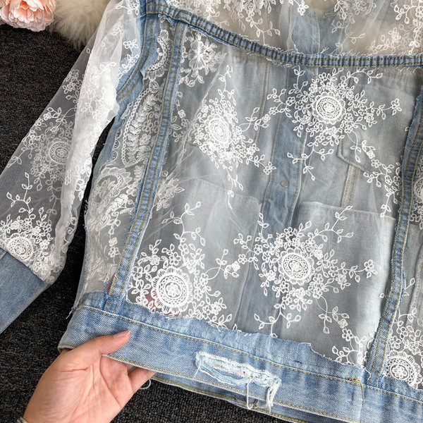 Praegune naiste teksajakk pitsi ja taskutega