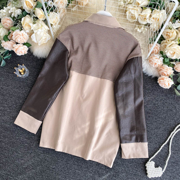 Naiste jope ökonahast laia mudeliga klassikalise krae ja taskutega