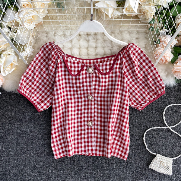 Rövid ujjú, gyöngygombos női ing