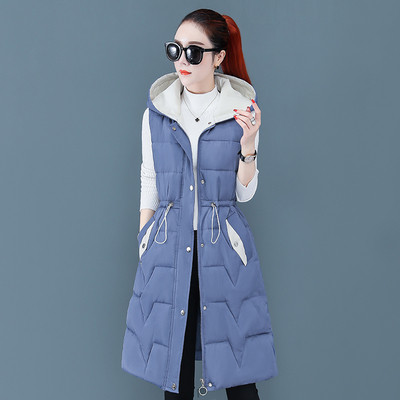 Jauns sieviešu vestes modelis ar kabatām un saitēm jostasvietā