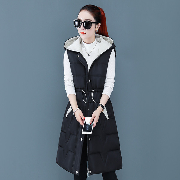 Jauns sieviešu vestes modelis ar kabatām un saitēm jostasvietā