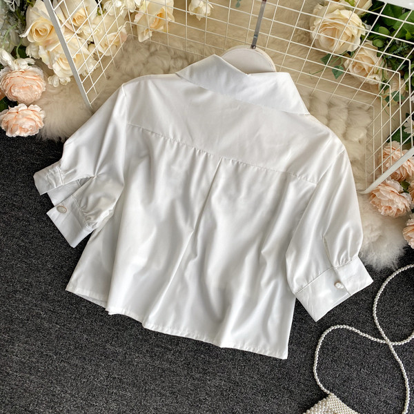 Naiste taskute ja klassikalise kraega särk