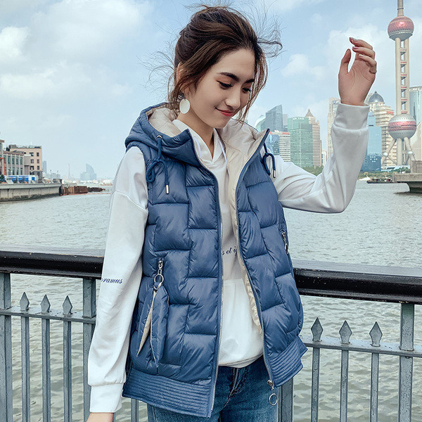 Γυναικείο αθλητικό γιλέκο με κουκούλα και τσέπες