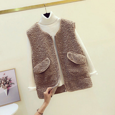 Női pehelymellény cipzárral és zsebekkel