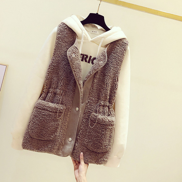 Női pehelymellény zsebekkel és gombokkal