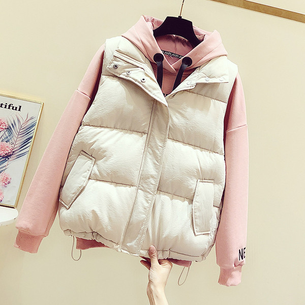 Női alkalmi mellény zsebekkel és cipzárral