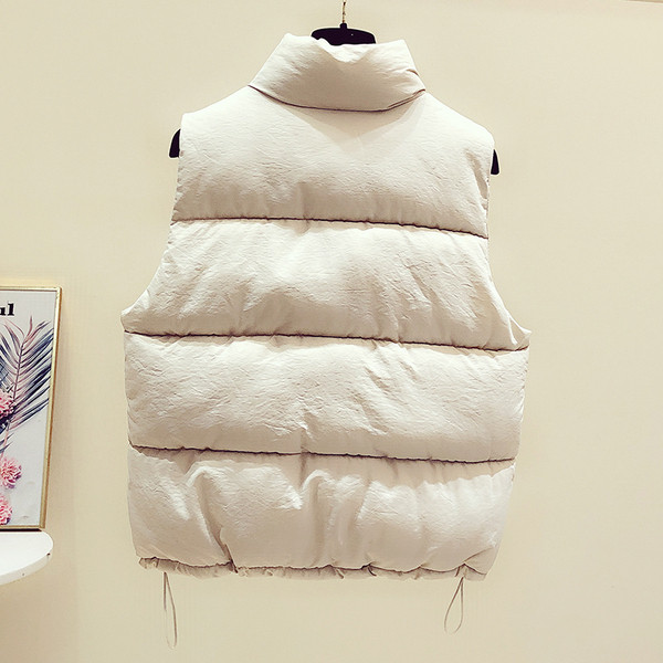 Női alkalmi mellény zsebekkel és cipzárral