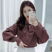 Stilīgs sieviešu krekls ar lenti un platām piedurknēm