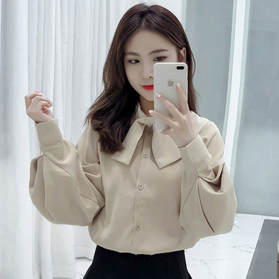 Stilīgs sieviešu krekls ar lenti un platām piedurknēm