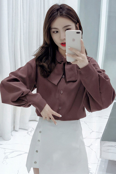 Stilīgs sieviešu krekls ar lenti un platām piedurknēm