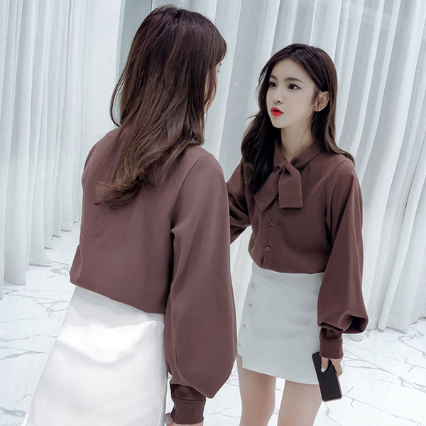 Stilīgs sieviešu krekls ar lenti un platām piedurknēm