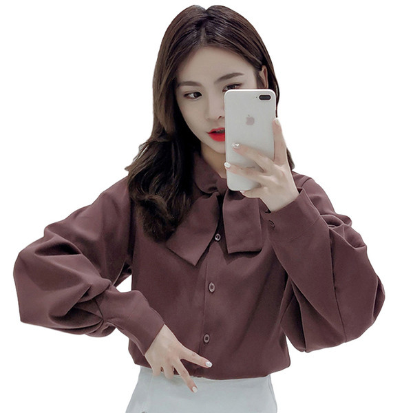 Stilīgs sieviešu krekls ar lenti un platām piedurknēm