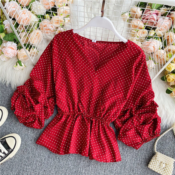 Modern női ing spitz nyakkivágással és nyakkendővel