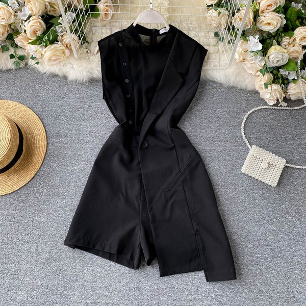 Női aszimmetrikus jumpsuit gombbal