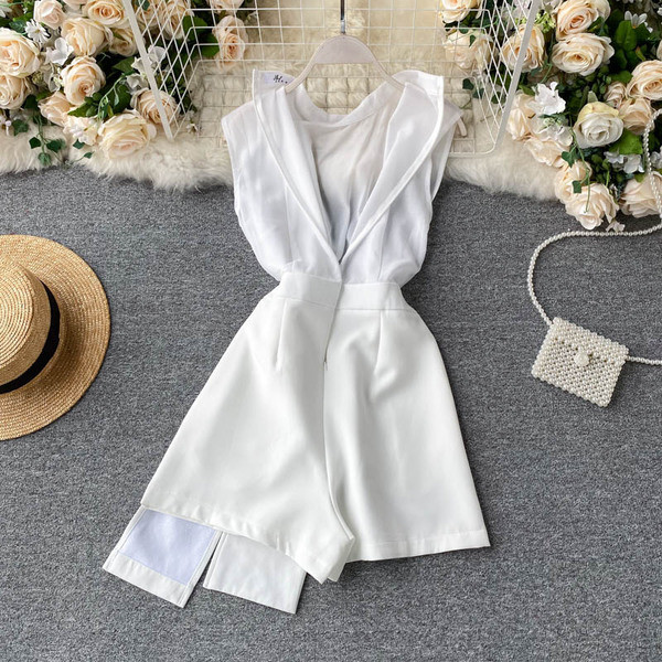 Női aszimmetrikus jumpsuit gombbal