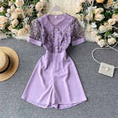 Modern női overál tüll és flitterekkel