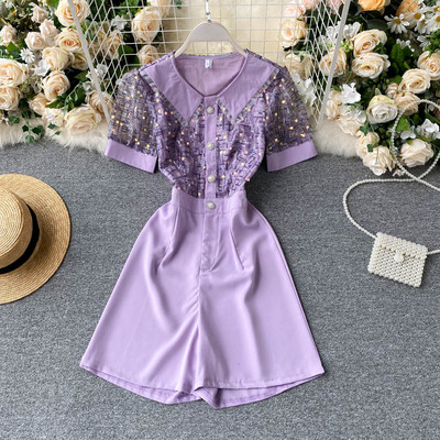 Modern női overál tüll és flitterekkel