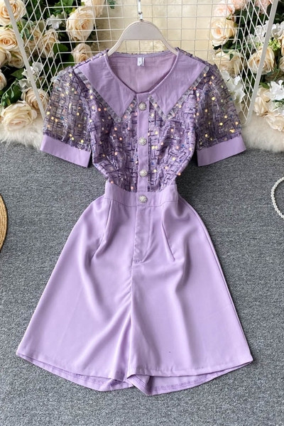 Modern női overál tüll és flitterekkel