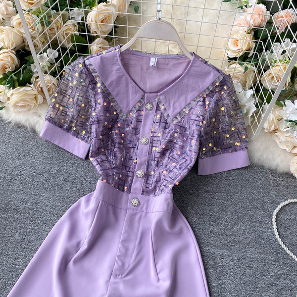 Modern női overál tüll és flitterekkel