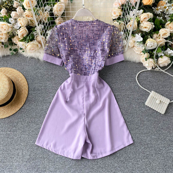 Modern női overál tüll és flitterekkel