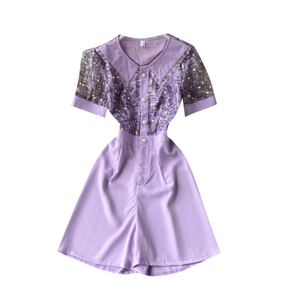 Modern női overál tüll és flitterekkel