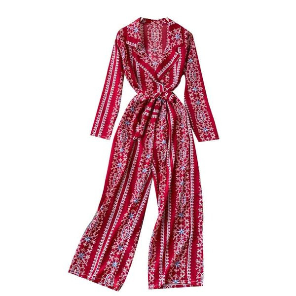 Garš sieviešu kombinezons ar krāsainu apdruku un jostu