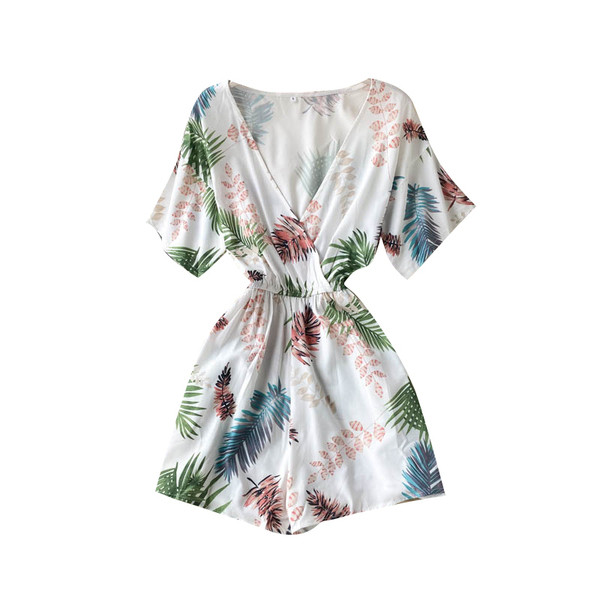 Balts sieviešu kombinezons ar ziedu apdruku un špica kakla izgriezumu