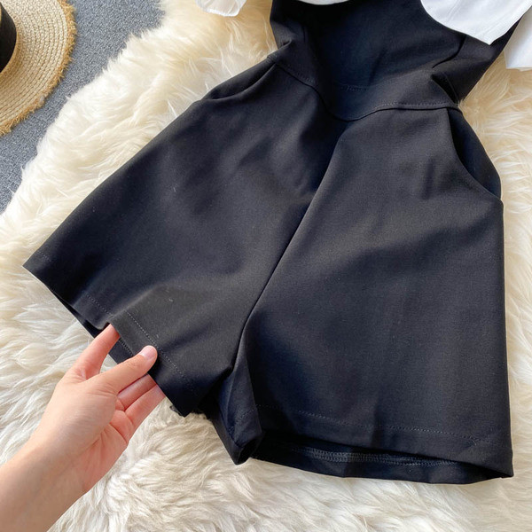 Mustvalge naiste kombinesoon