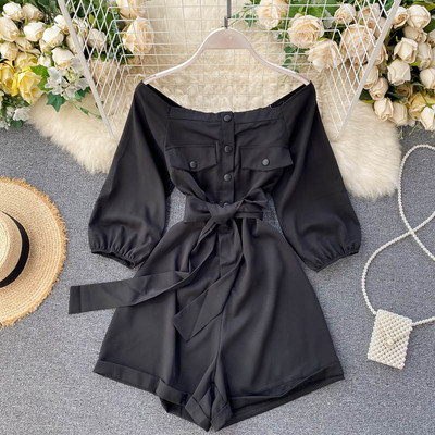 Női overall gombokkal és övvel