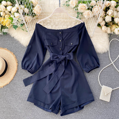 Női overall gombokkal és övvel