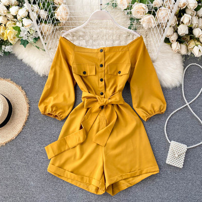 Női overall gombokkal és övvel