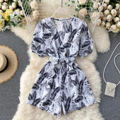 Moodne naiste kombinesoon V-kaelusega, trükitud sulgedega