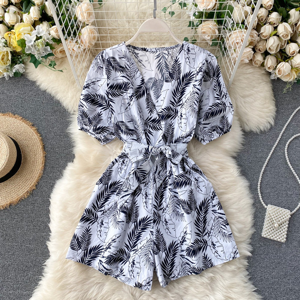 Moodne naiste kombinesoon V-kaelusega, trükitud sulgedega