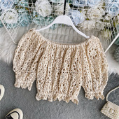 Modern, rövid kötött női blúz ovális nyakkivágással