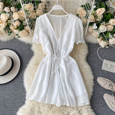 Modern női overall spitz nyakkivágással és nyakkendővel