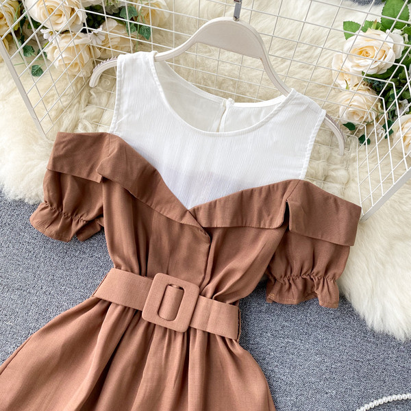 Moodne paljaste õlgadega naiste kombinesoon