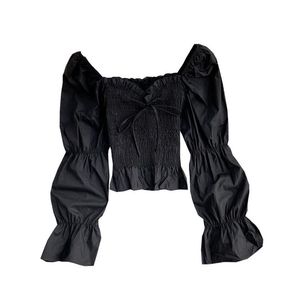 Moodne naiste pluus kandilise kaelusega ja lipsudega