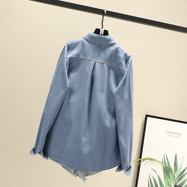 Naiste värvilise tikandi ja taskuga teksasärk