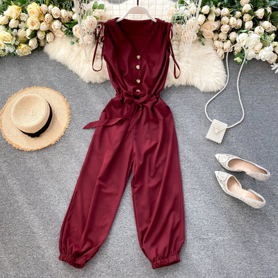 Μοντέρνα γυναικεία ολόσωμη φόρμα με λαιμόκοψη, κουμπιά και κορδόνια