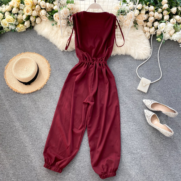 Μοντέρνα γυναικεία ολόσωμη φόρμα με λαιμόκοψη, κουμπιά και κορδόνια