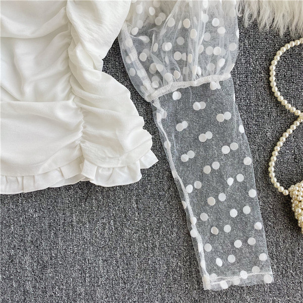 Naiste stiilne pikkade varrukate ja lipsudega lühike pluus