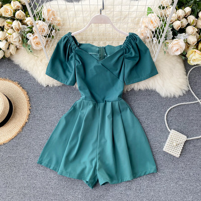 Modern női overall spitz nyakkivágással és cipzárral