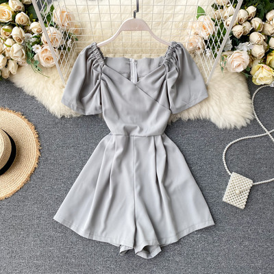 Modern női overall spitz nyakkivágással és cipzárral