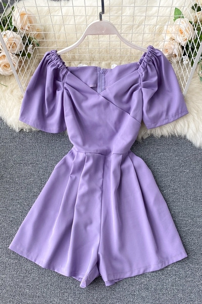 Modern női overall spitz nyakkivágással és cipzárral