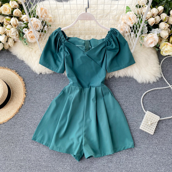 Modern női overall spitz nyakkivágással és cipzárral