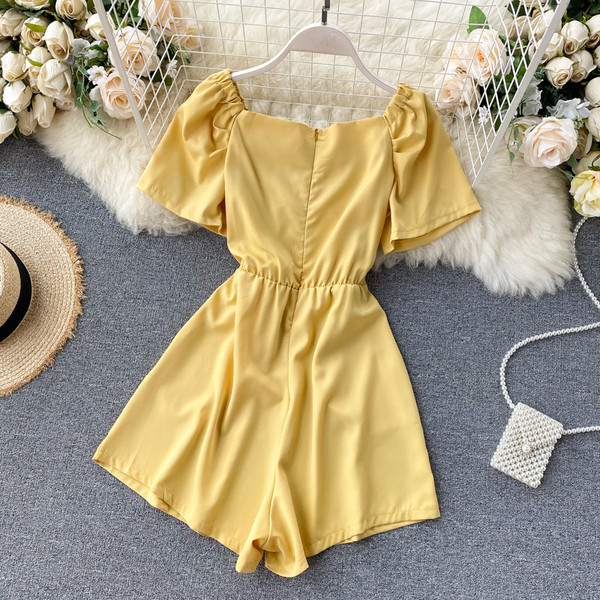 Modern női overall spitz nyakkivágással és cipzárral