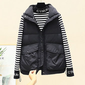 Valge ja musta värvi nööpide ja lukuga naiste vest